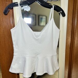 White peplum top